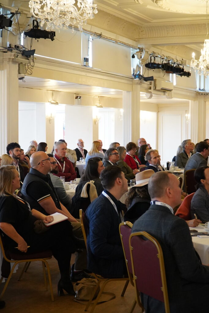 People seated at business event