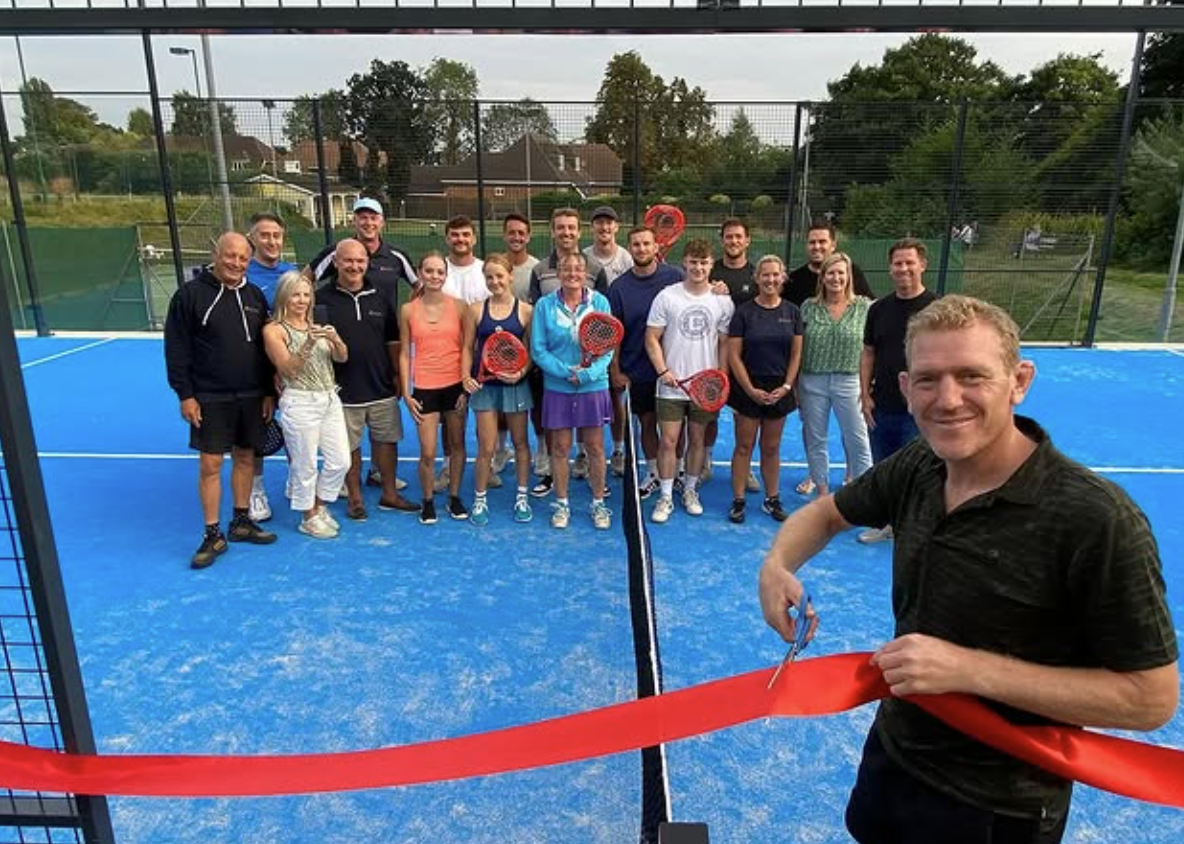 picture of people celebrating opening of padel tennis court